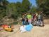 Un grup de voluntaris preparen la llacuna de l'Estany Tort per l'arribada del samaruc